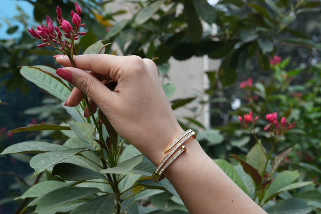 Vioras Double Crystal Nail Bangle worn on the wrist