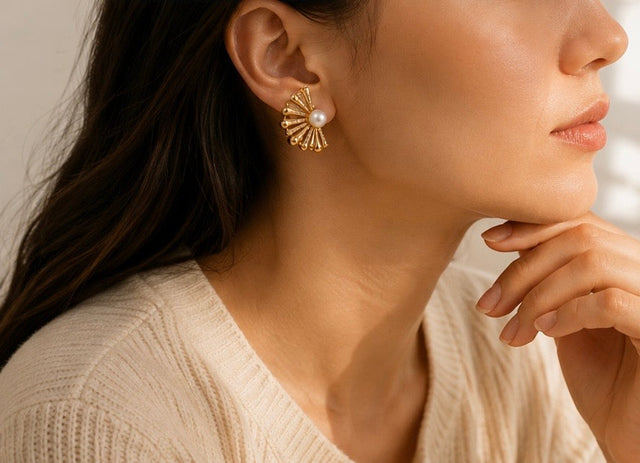 Vioras Pearl Fan Stud Earrings worn on the ear