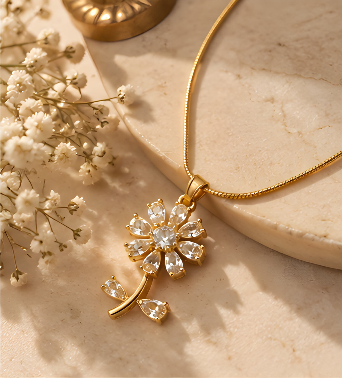 Vioras crystal blossom flower pendant product flat lay on marble