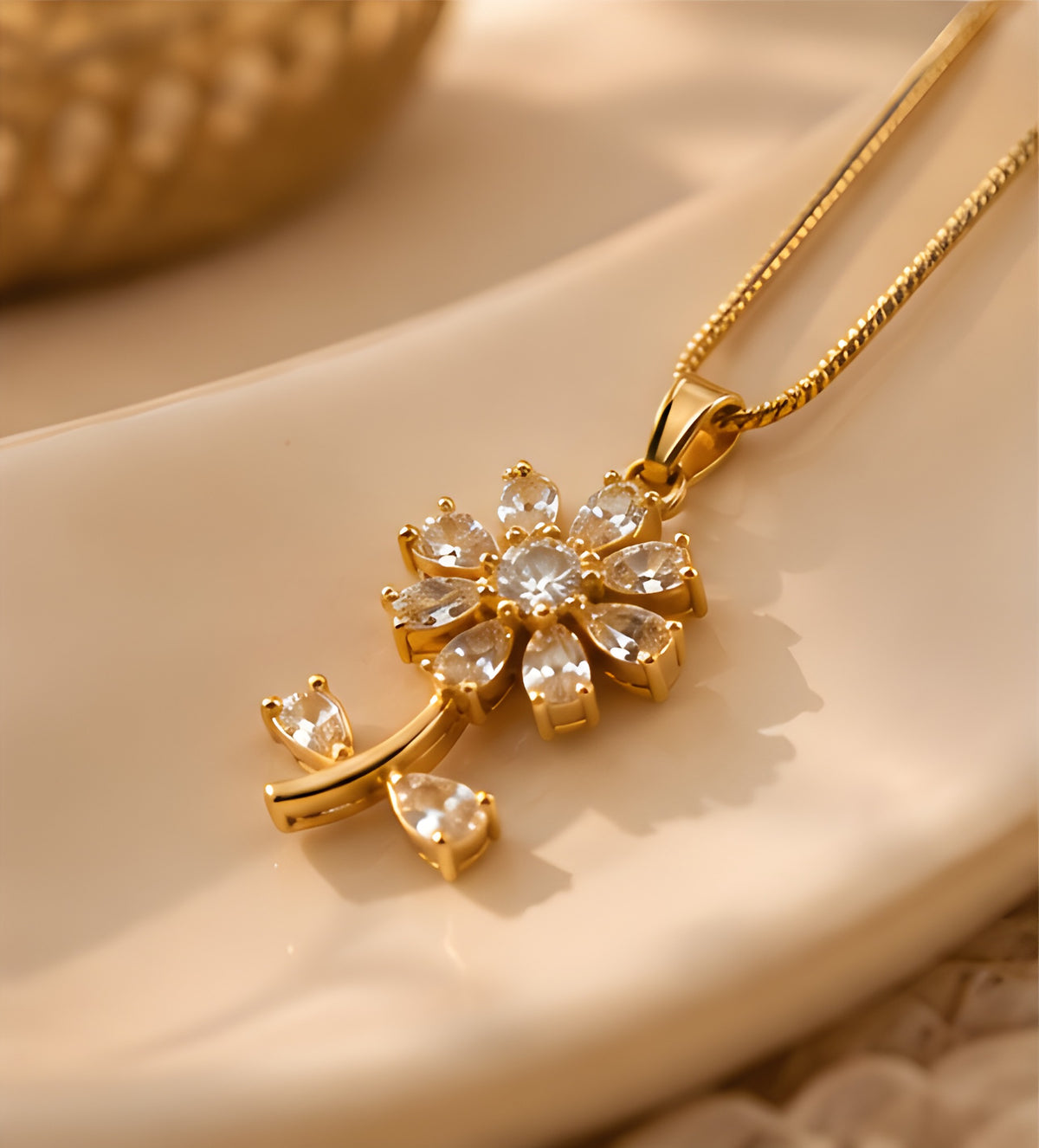 Close-up of crystal blossom pendant styled on a dish