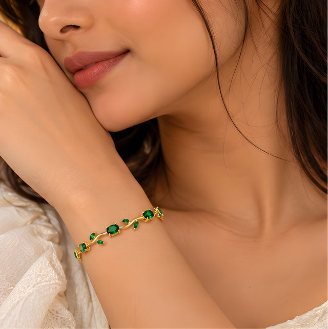 Vioras emerald green vine tulip bracelet worn on wrist