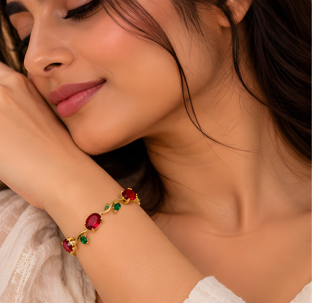 Vioras gold vine tulip bracelet worn on wrist