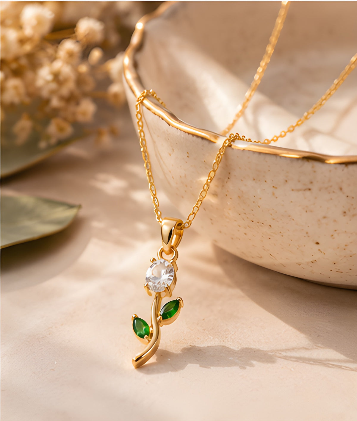 Vioras White Tulip Pendant styled beside ceramic bowl