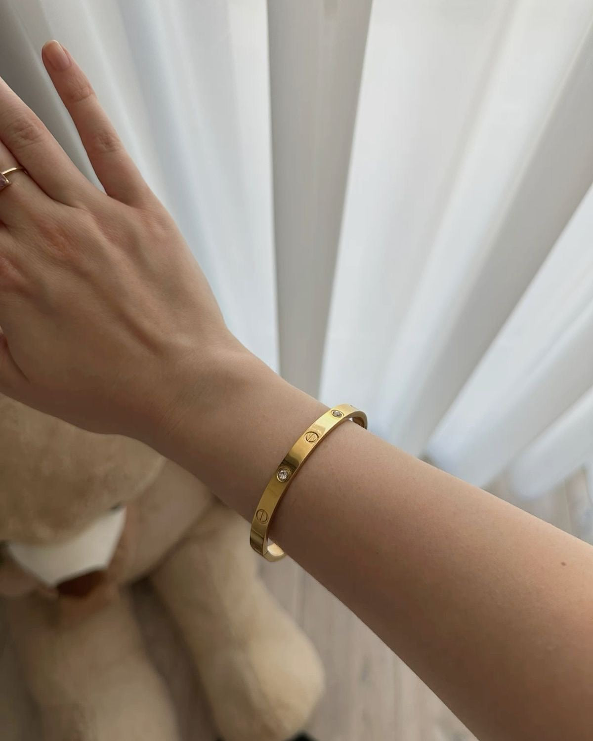 Viorass Screw Detail Crystal Bangle worn on wrist